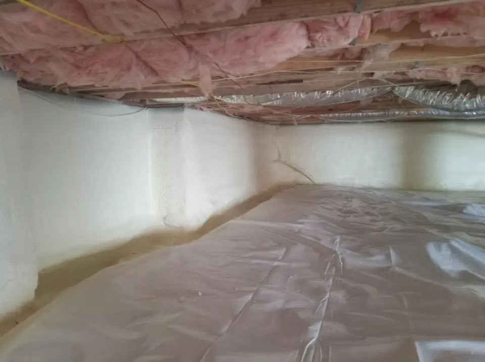 Crawl space encapsulation with closed-cell spray foam for Commercial Roof Restoration in Hampden